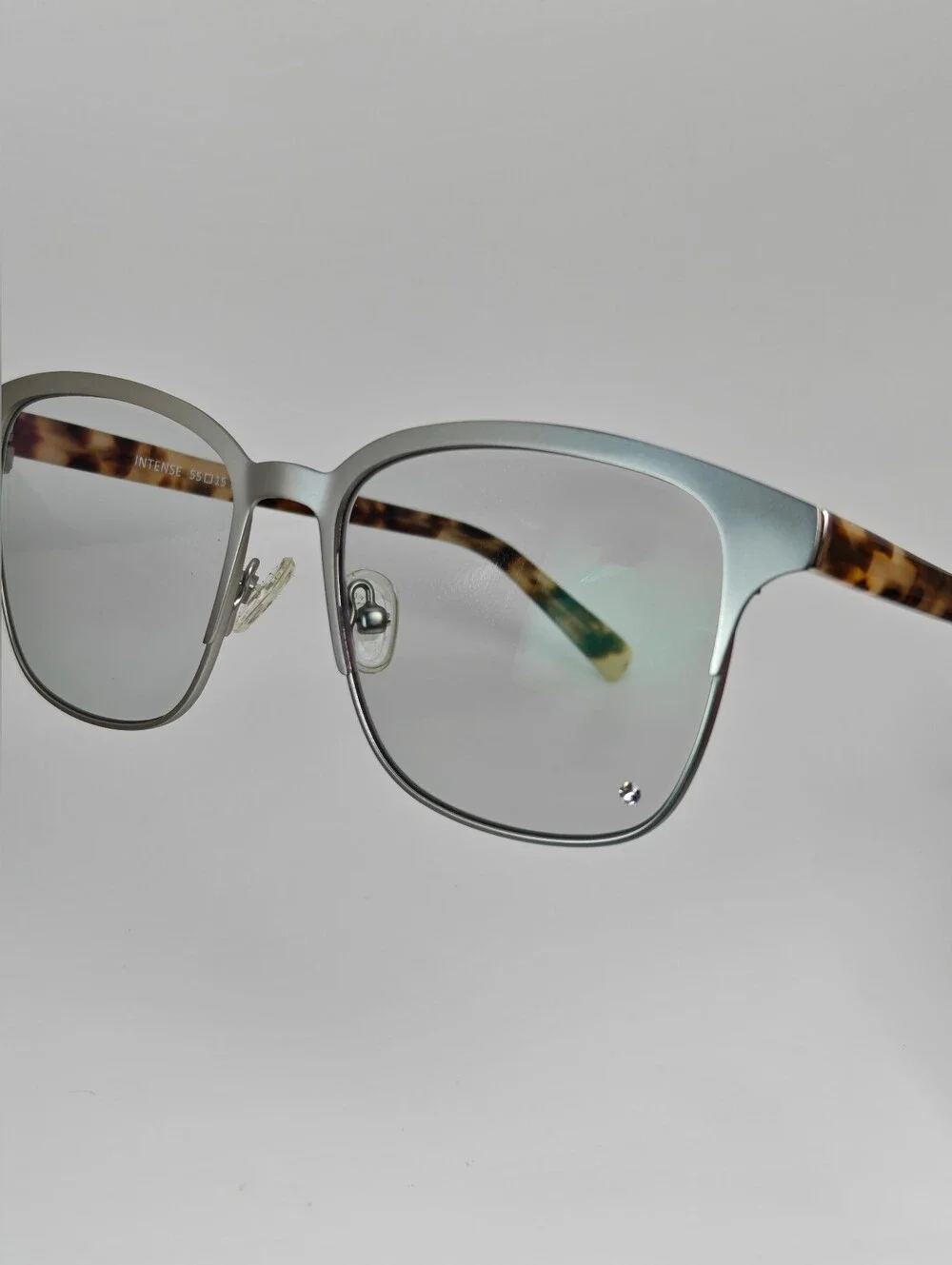 Intense. Brushed Silver Front, Bone Tortoise Temples. Women's.